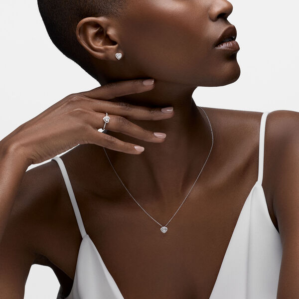 White Gold And Diamond Heart Shape Stud Earrings