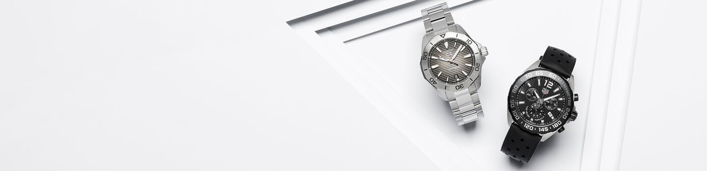 Two TAG Heuer watches on a white background.