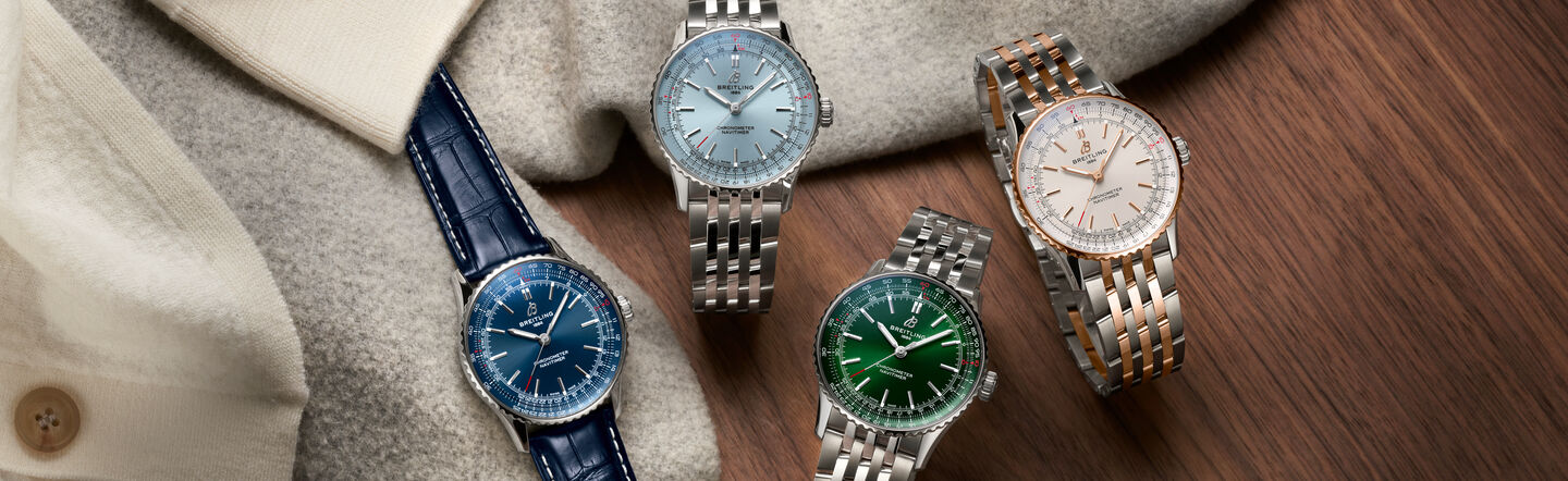 Four Breitling Navitimer watches.