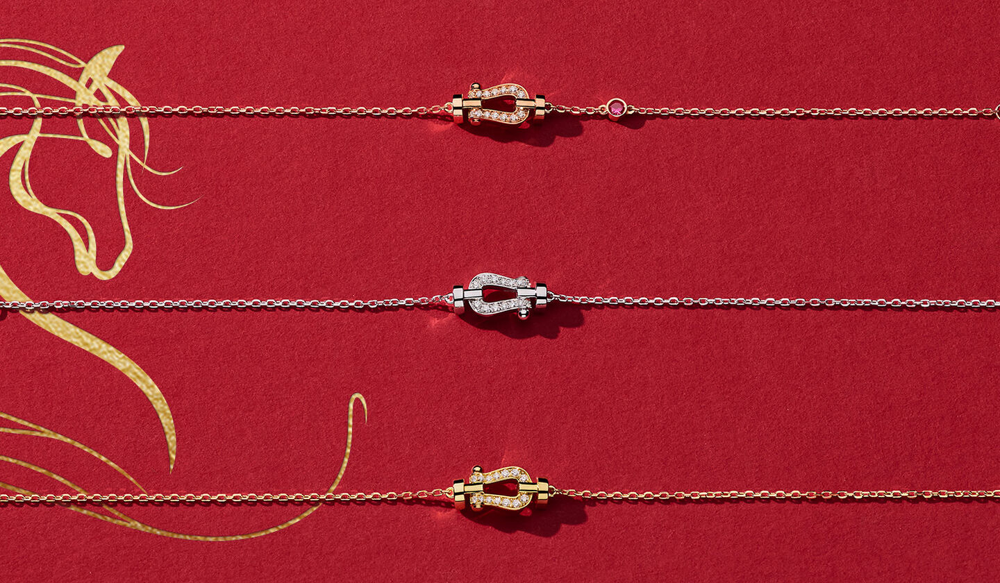 FRED Force 10 jewellery on a red background.