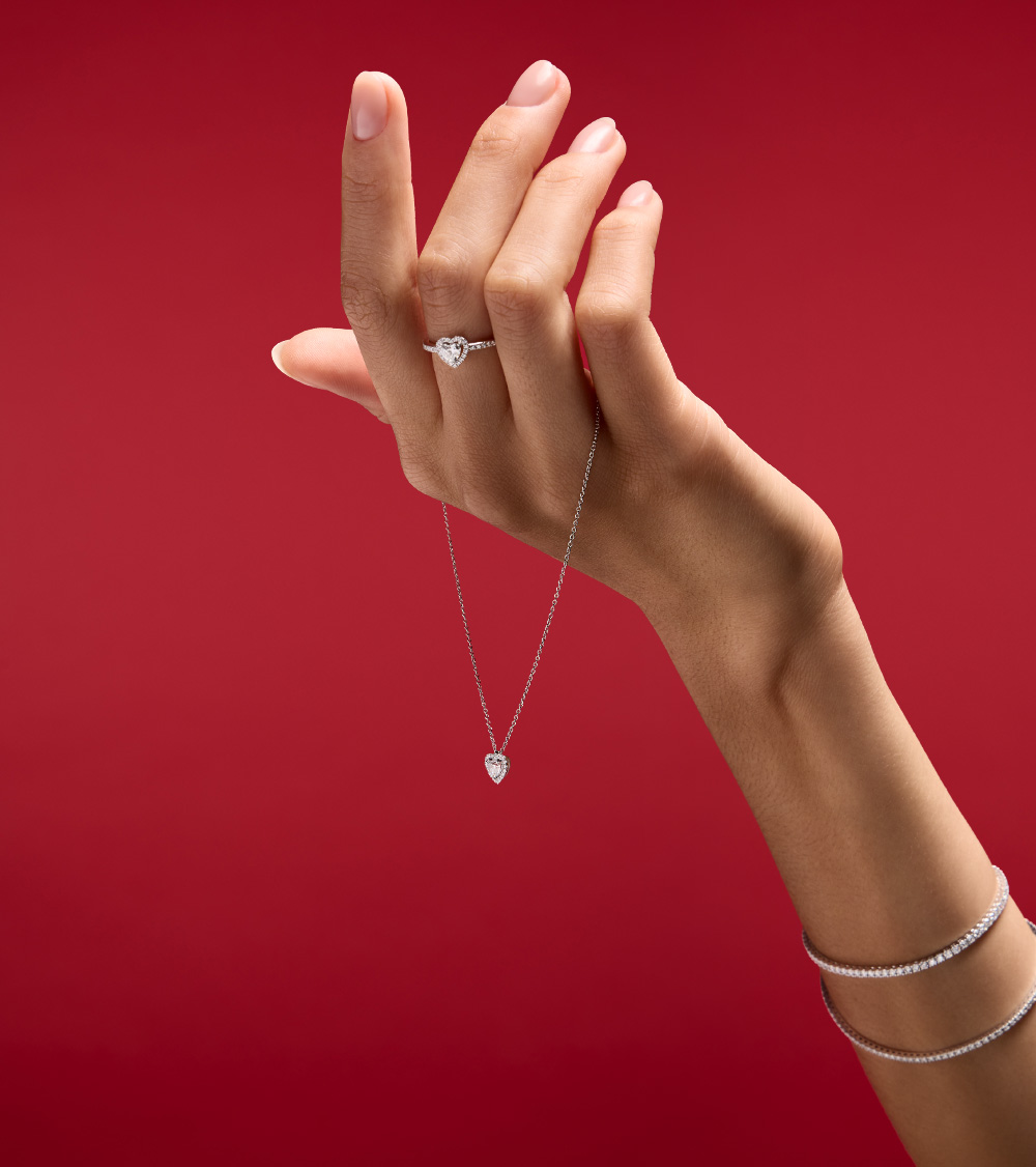 Heart jewellery on a red background