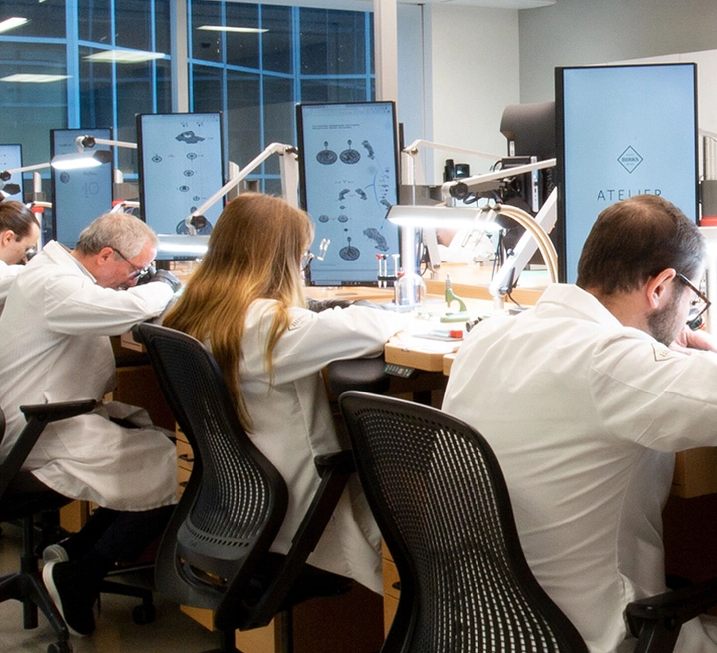 Maison Birks watchmakers at work in the Atelier centre.