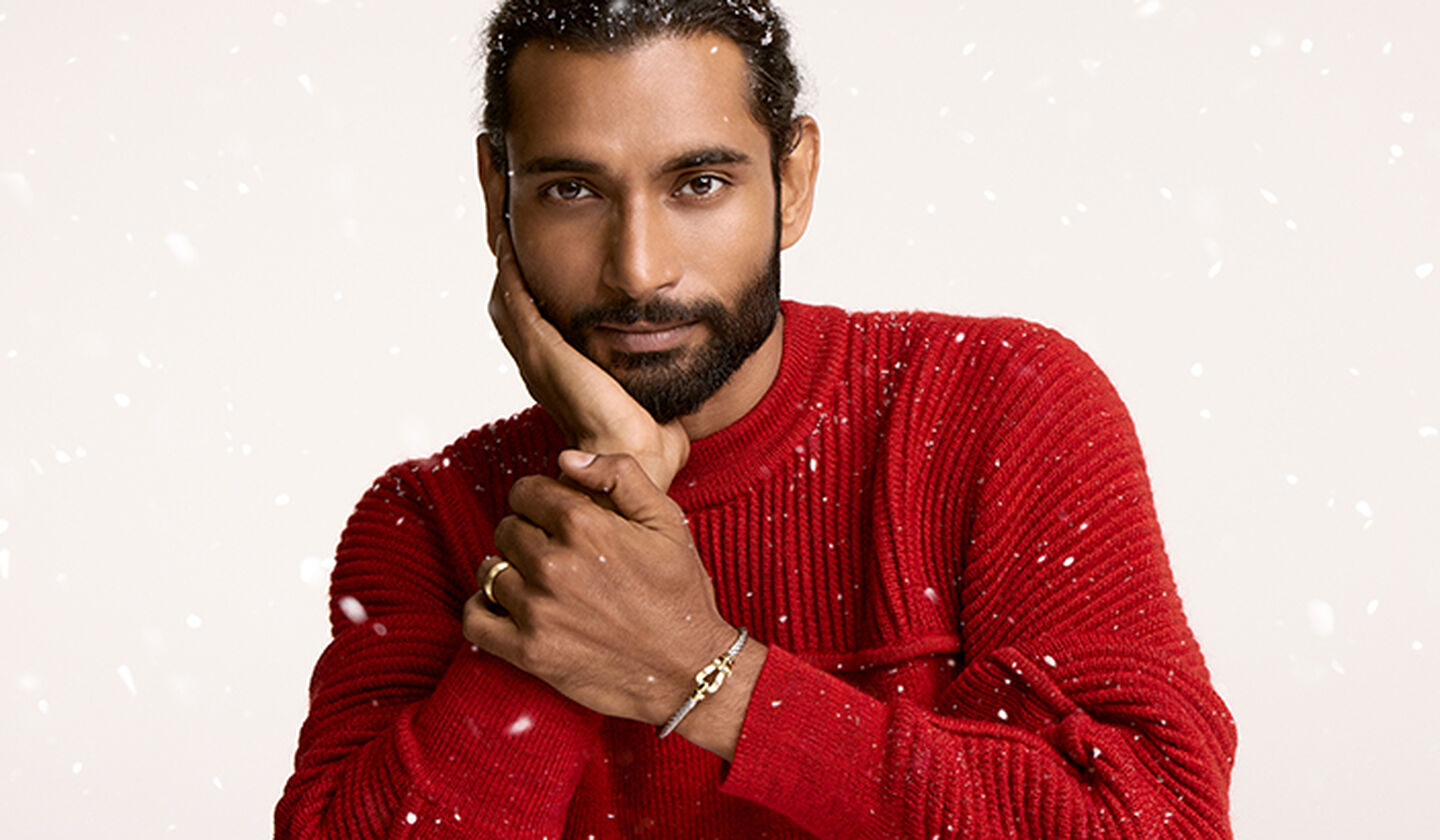 A man wearing jewellery from Maison Birks.