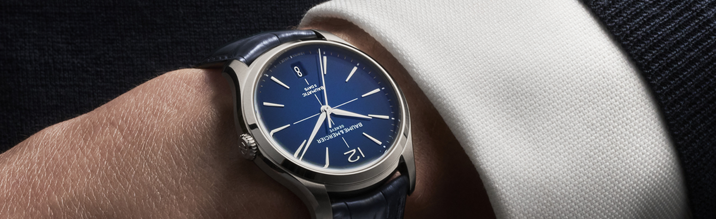 A man wearing a Baume & Mercier watch.