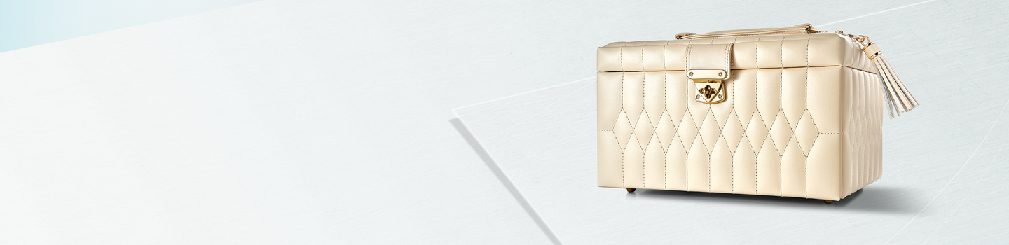 Wolf jewellery box on light blue background.