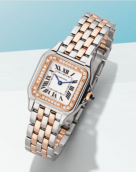 A Panth&egrave;re de Cartier watch for women on a light blue background.