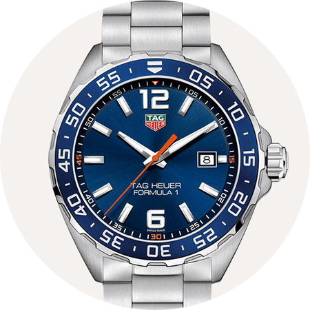 TAG Heuer Formula 1 watch on a beige background.